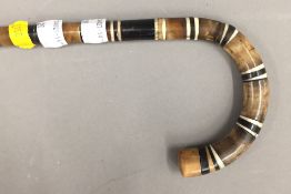 A horn and bone segmented walking stick