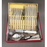 A small quantity of plated flatware