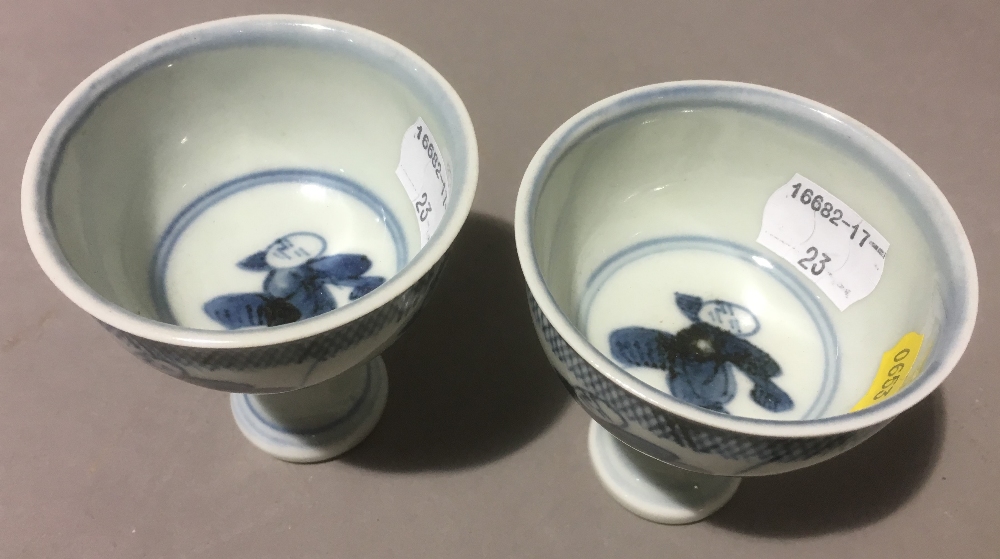 A pair of Chinese blue and white porcelain stem cups Both figurally decorated, - Image 5 of 8