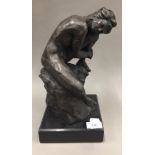 A bronze abstract of a girl