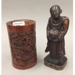 A 17th century Chinese carved bamboo figure of a Buddhist priest and a 19th century carved Chinese