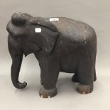 A large wooden model of an elephant