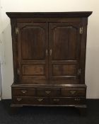 A Georgian oak linen press