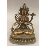 A gilt bronze model of Buddha