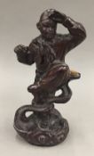 A carved wooden figure of a monkey