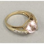 A 9 ct gold pink sapphire and diamond set ring, size N/O,