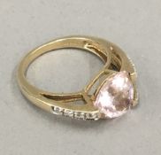 A 9 ct gold pink sapphire and diamond set ring, size N/O,