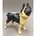 A cast iron pug dog
