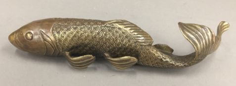 A bronze model of a fish