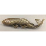 A bronze model of a fish