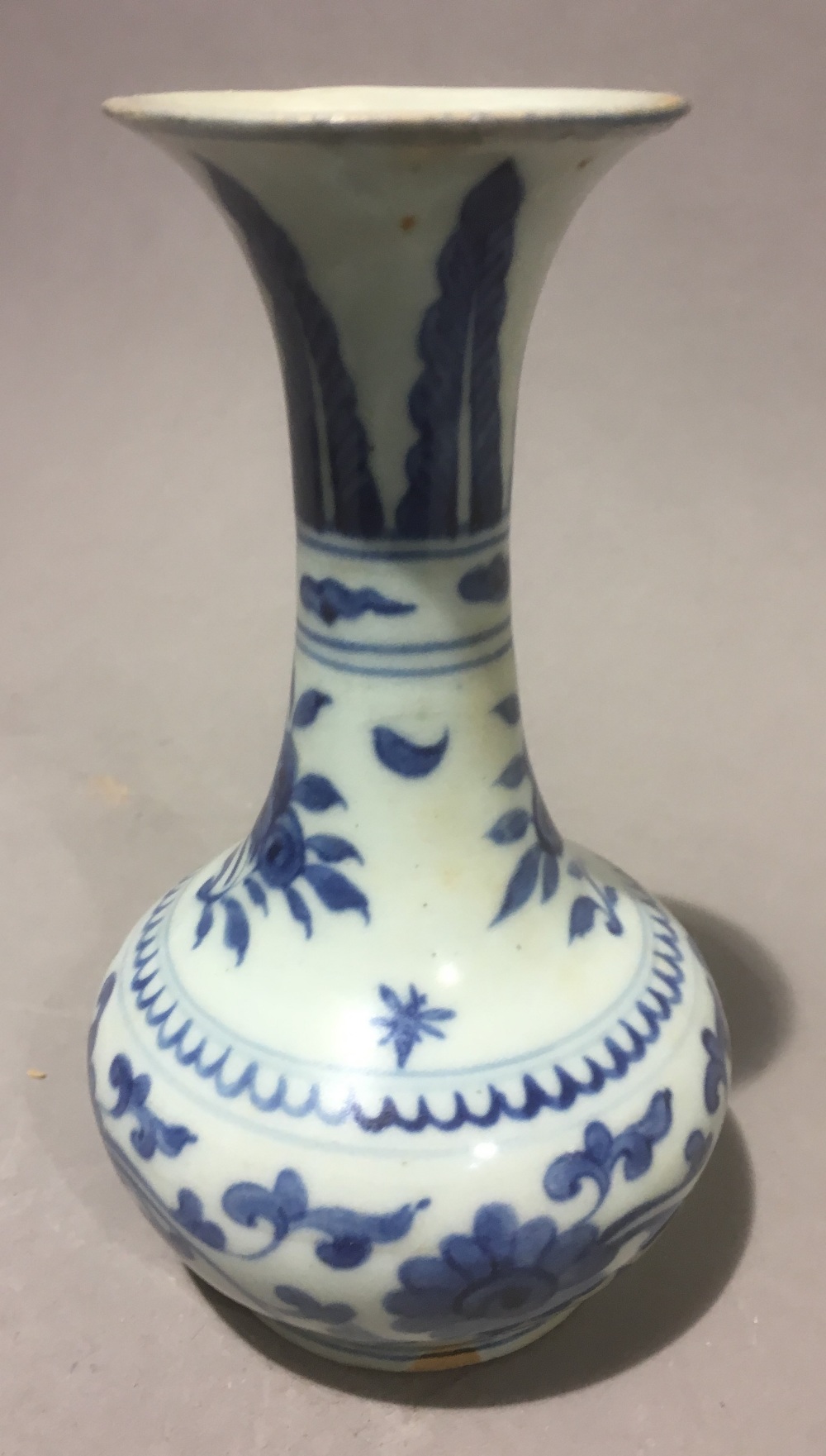 A Chinese blue and white porcelain baluster vase, decorated with floral sprays and lotus strapwork. - Image 4 of 7