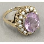 A 9 ct gold amethyst and seed pearl ring (5.