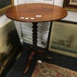 A Victorian mahogany tilt top tripod table