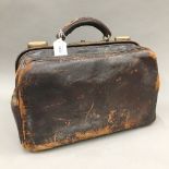 A vintage Gladstone bag