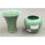 A green glazed flared vase and another similar