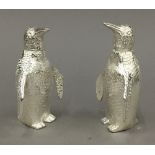 A pair of penguin formed salt and peppers