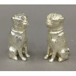 A pair of dog formed salt and peppers