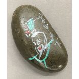 A Chinese pebble decorated with calligraphy