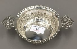 A finely worked silver two handled quaich London 1883,