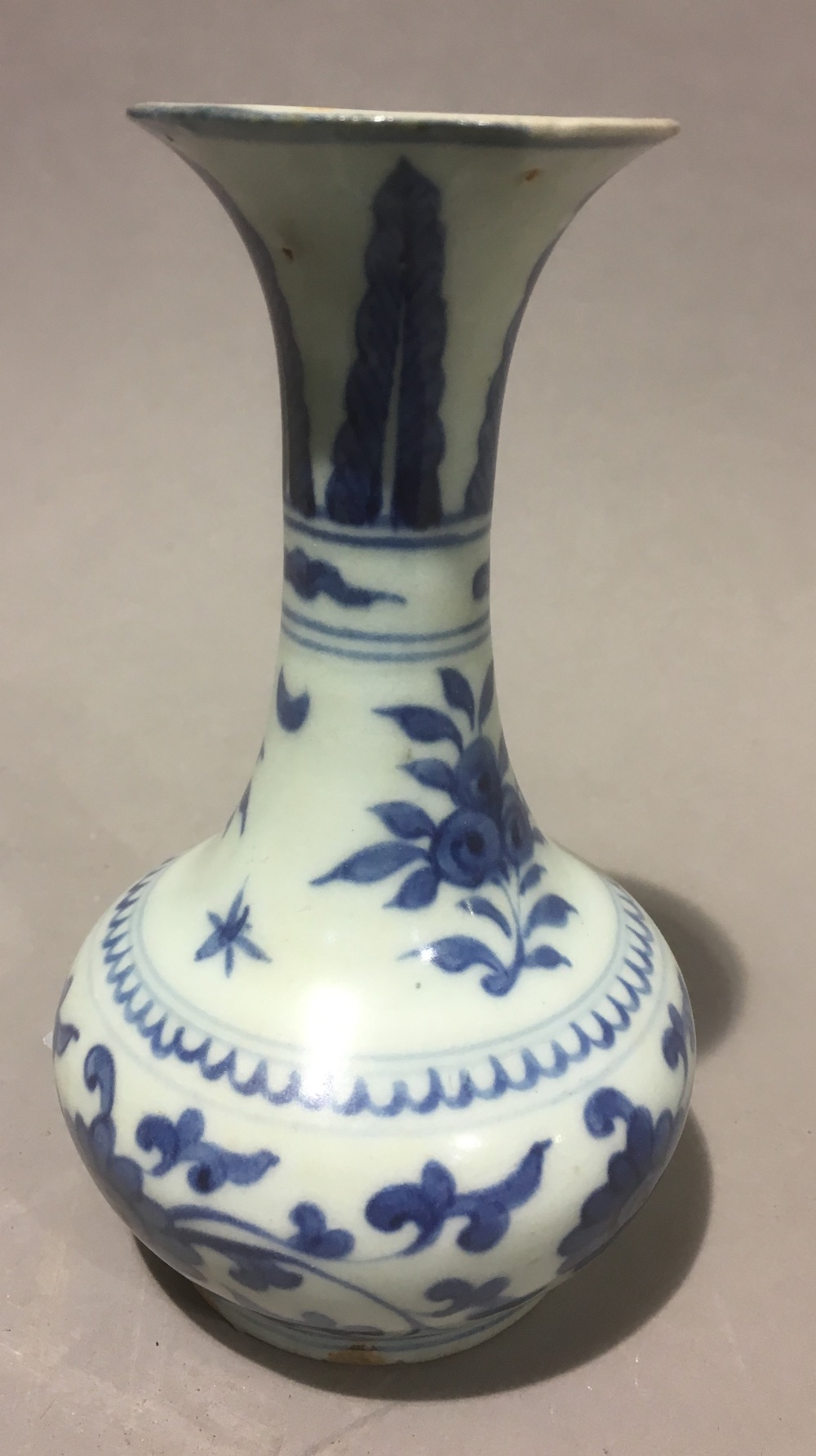 A Chinese blue and white porcelain baluster vase, decorated with floral sprays and lotus strapwork. - Image 3 of 7