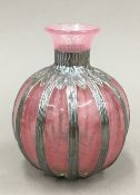 A silver clad Art glass vase