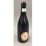 A bottle of 1934 Trinity College Audit Ale