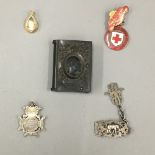 A bakelite vesta, a quantity of badges, etc.