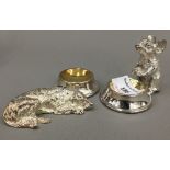 A pair of silver plated animal form salts