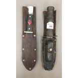 A vintage American Commando knife in leather sheath,