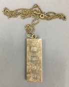 A 9 ct gold ingot on chain (36.