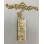 A 9 ct gold ingot on chain (36.