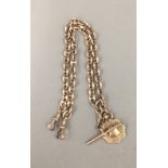 A 9 ct gold watch chain and medal fob (approximately 44 grammes)
