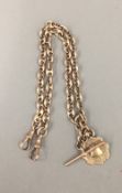 A 9 ct gold watch chain and medal fob (approximately 44 grammes)