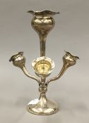 A silver three branch bud vase