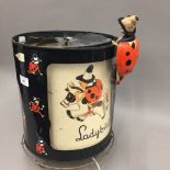 A 1950s ladybird lamp and figure