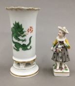 A 19th century hand painted Meissen porcelain vase and a small 19th century German porcelain figure