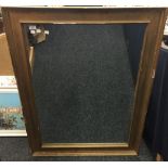A large giltwood mirror