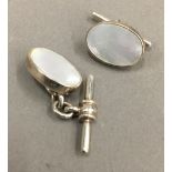 A pair of silver and mother-of-pearl cufflinks