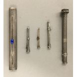 Five silver propelling pencils