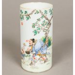 A Chinese porcelain brush pot Of circular section,