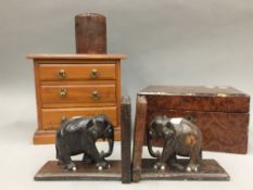 A miniature chest of drawers,