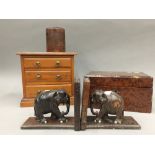 A miniature chest of drawers,