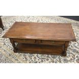 A modern two drawer oak coffee table