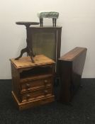 A small chest of drawers, a drop leaf table, a display cabinet,