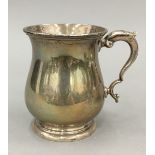A silver Christening mug
