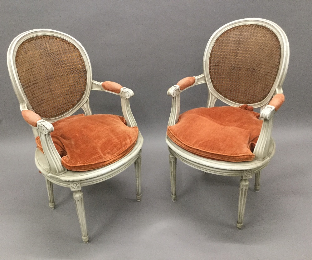 A pair of late 19th/early 20th century caned painted open armchairs Each shaped moulded caned oval - Image 2 of 2