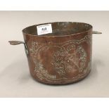 A 19th century engraved copper pot,