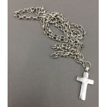 A silver crucifix on silver chain (29 grammes total weight)