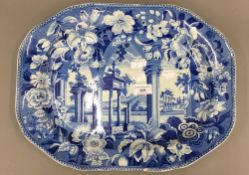 An early 19th century blue and white meat plate,