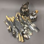 A quantity of silver plated flatware, together with two plated Guernsey milk jugs, etc.